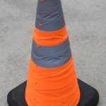 orange collapsible cone with lights